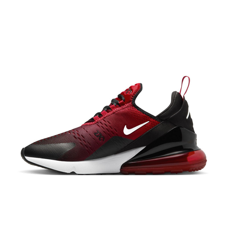 Men's Nike Air sneaker side view, red upper with black midfoot cage and white swoosh.