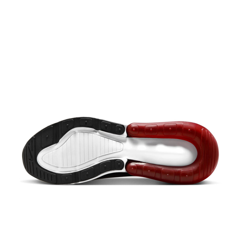 Men's Nike Air sneaker outsole, textured tread with white midsole and red air unit.
