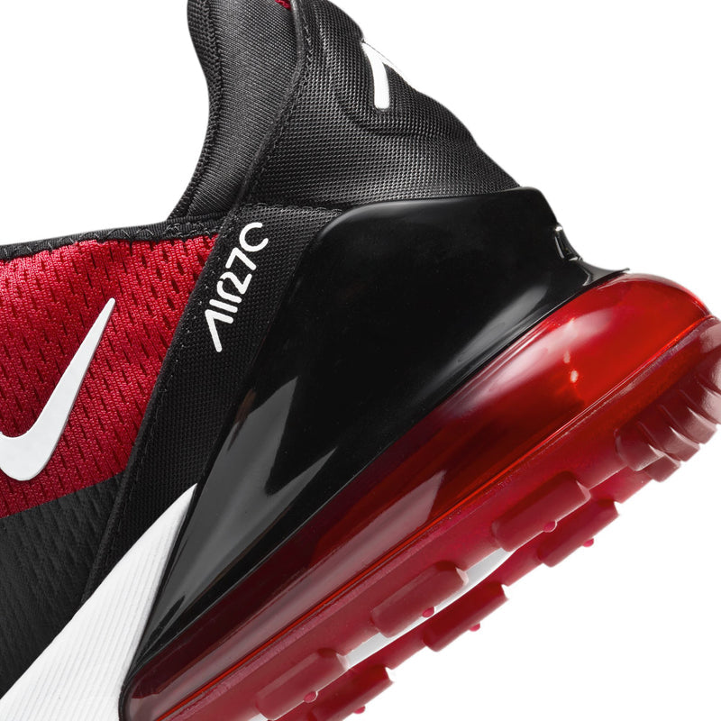 Close-up of men's Nike Air sneaker, red air sole with black upper and white accents.