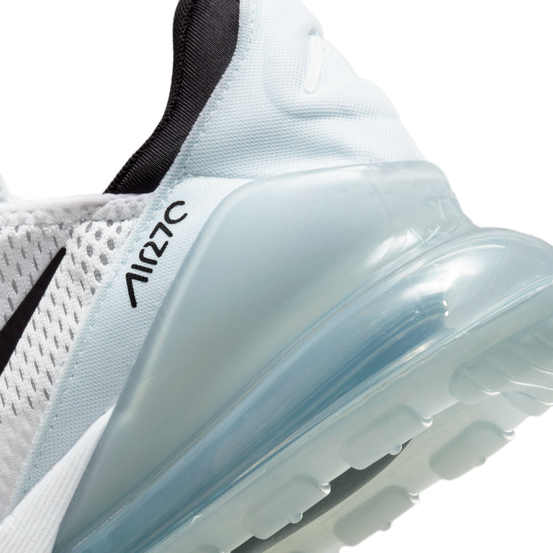 Close-up of white heel with black pull tab and transparent blue Air cushioning