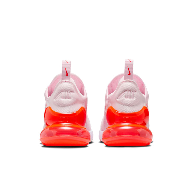 Heel view of light pink sneakers with red Air unit and Nike logo