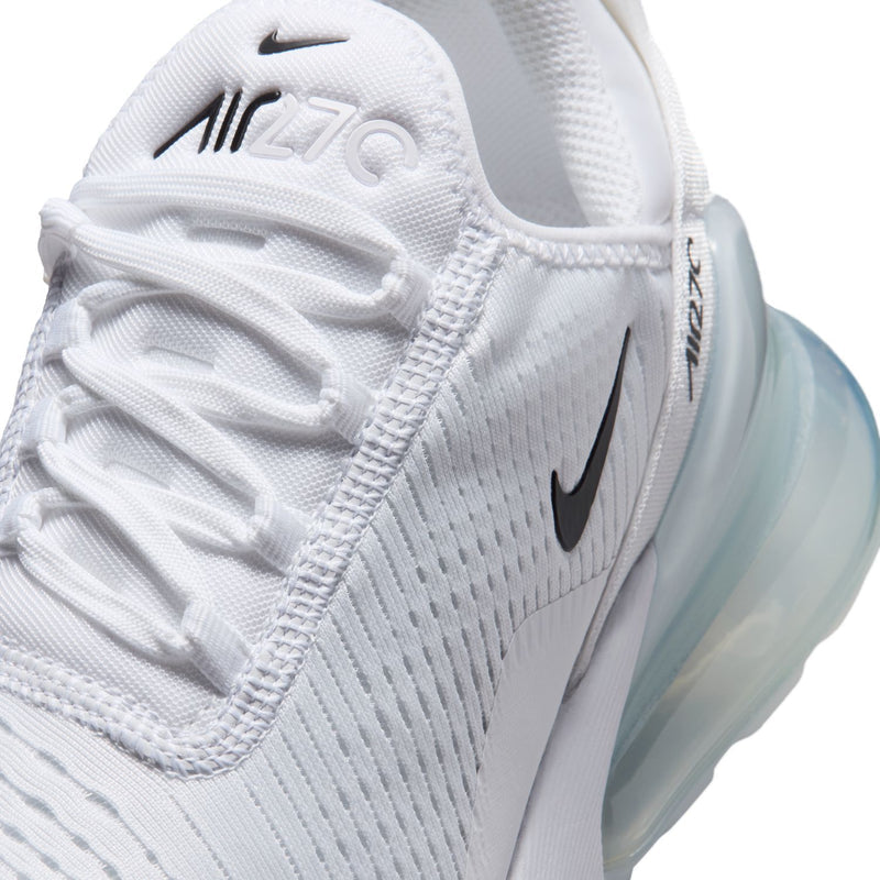 Close-up of white Air Max 270 upper with laces, Air branding, and black Swoosh