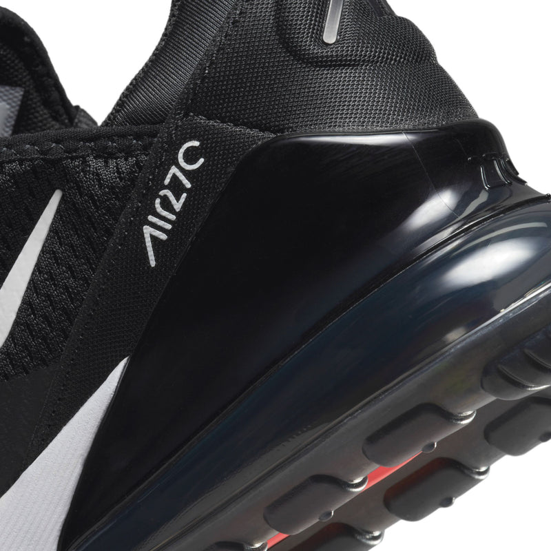Close-up: black Air Max 270 side with Air unit and small red accent