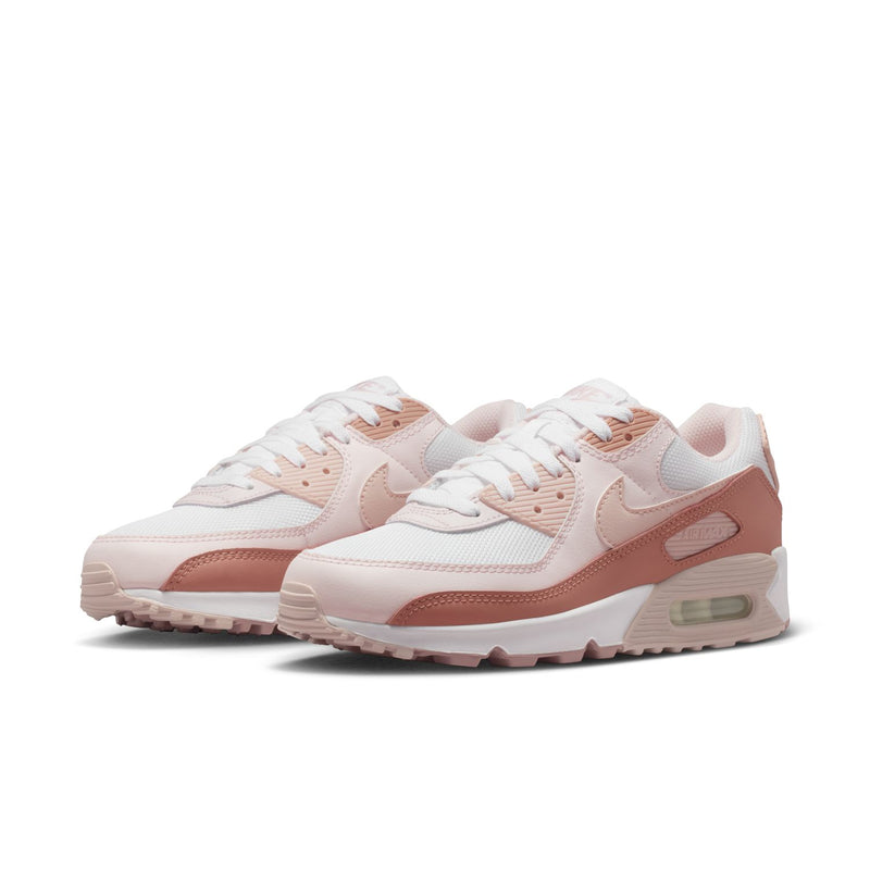Women’s Nike Air Max 90 sneakers, white uppers with pink overlays and Air Max cushioning