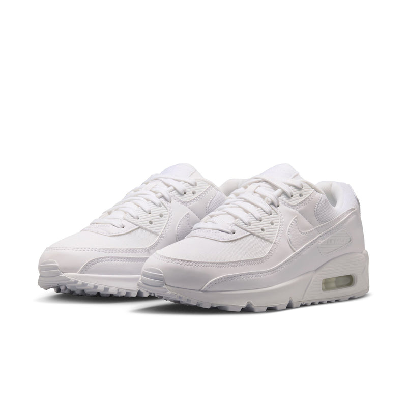 Women's white lace-up sneakers, side Swoosh logos and cushioned sole