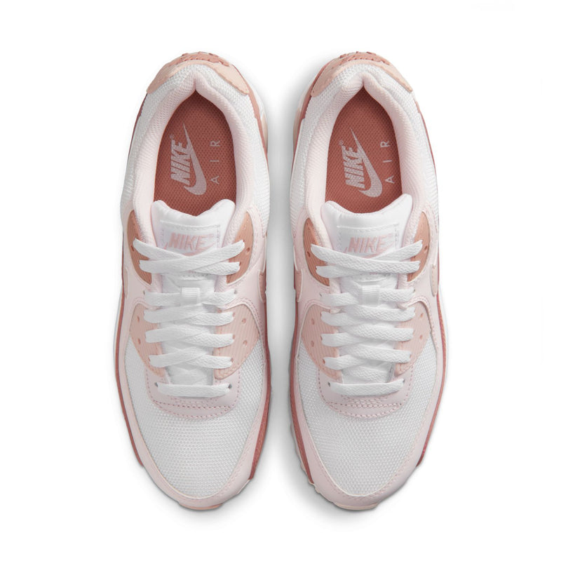 Pair of Women’s Nike Air Max 90 sneakers, white knit with dusty rose laces and trim