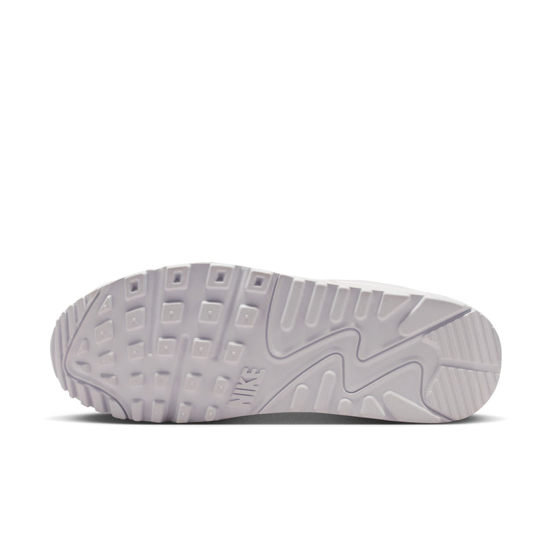 White sneaker outsole with traction tread and raised grid pattern