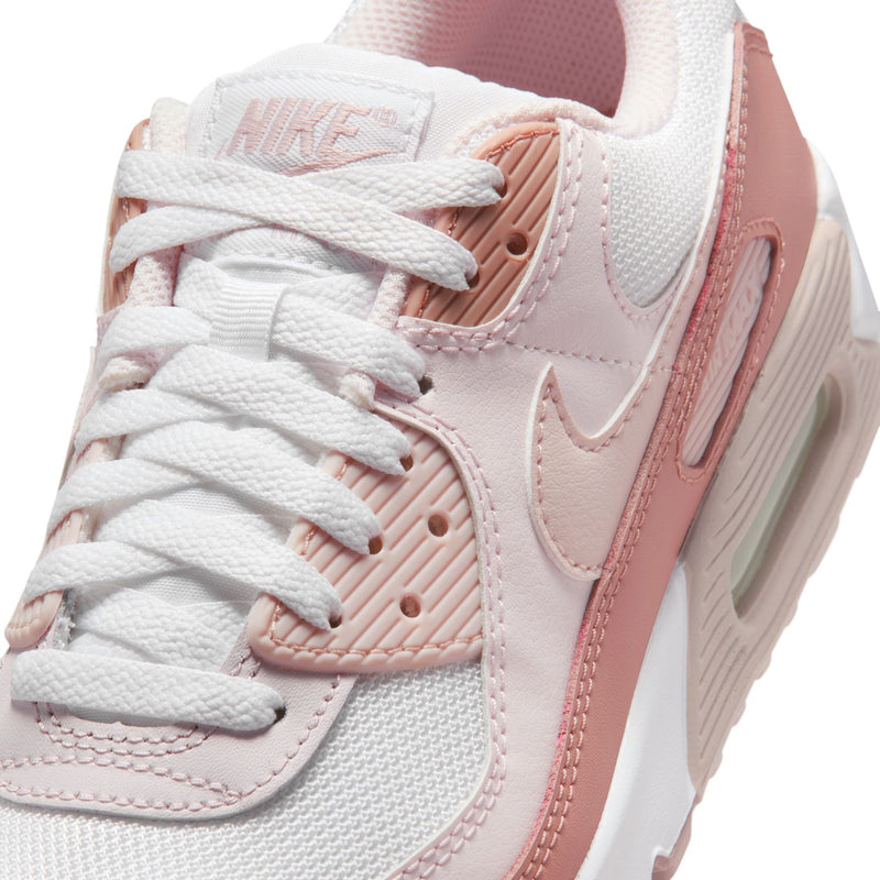 Women’s Nike Air Max 90 close-up, white laces on pink-and-white mesh upper