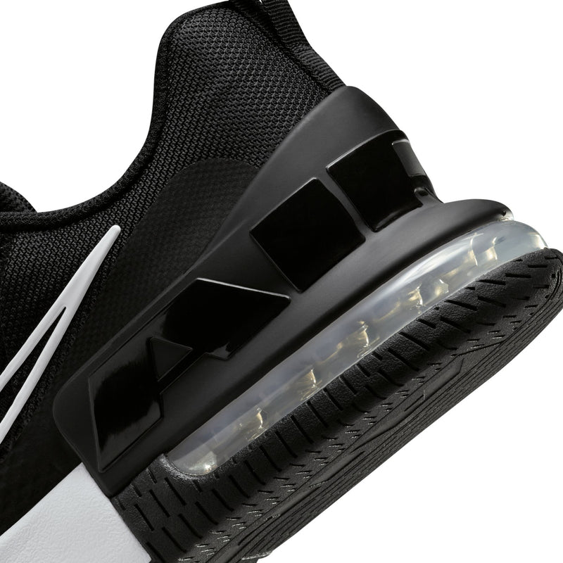 Side detail of men's black training sneaker with strap-like panel and Air Max unit