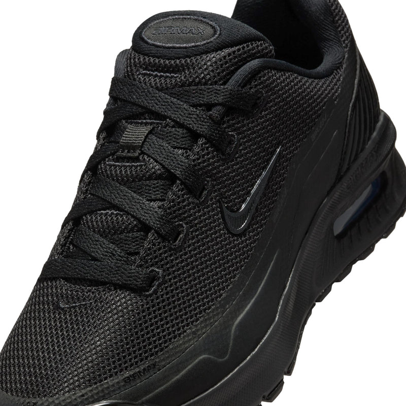 Black youth Nike Air Max Bia sneakers, mesh upper and curved swoosh close-up