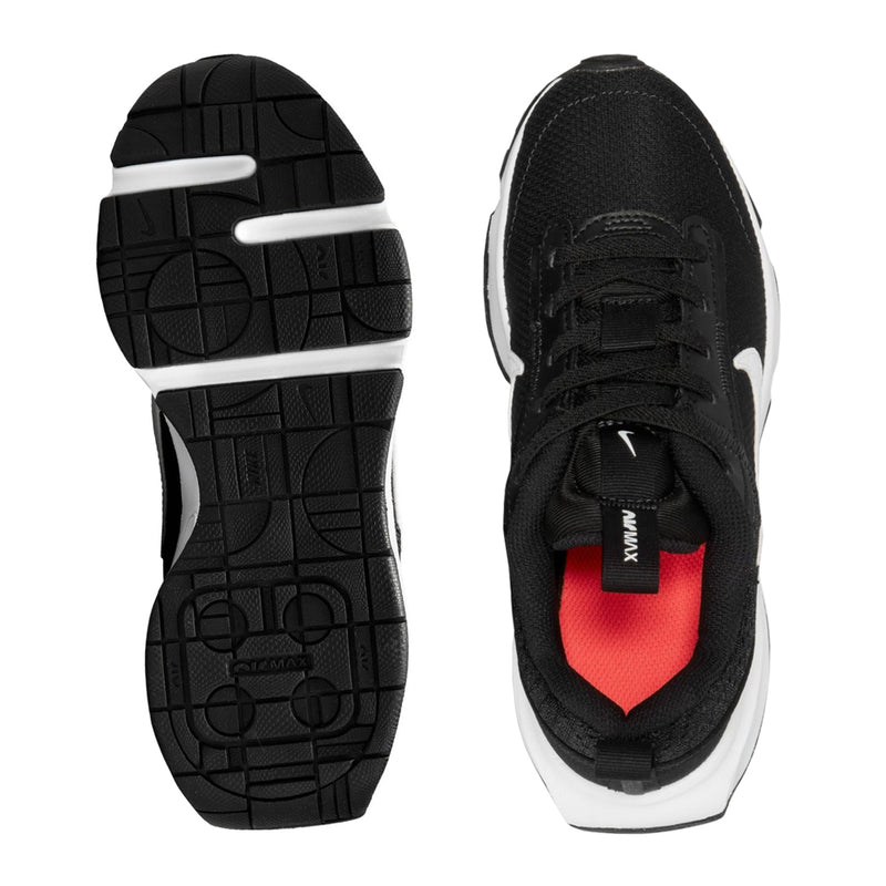 Kids' black sneaker outsoles with grid tread and white heel accent