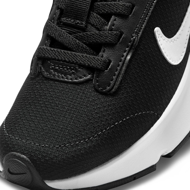 Kids' black Nike sneaker upper with white swoosh and stitched overlay details