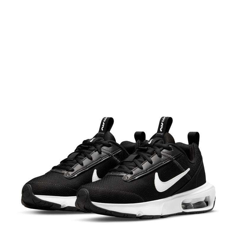 Pair of youth Nike Air Max sneakers, black uppers with white swooshes and Air soles