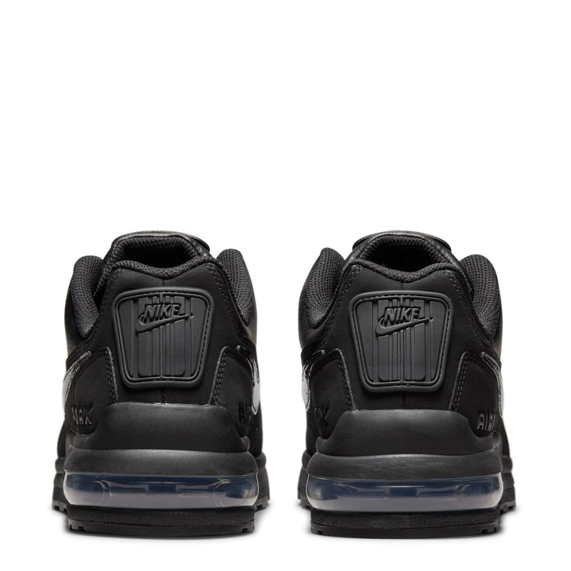 Black men's Air Max sneakers, rear view with heel tabs, lace area, and Nike logo.