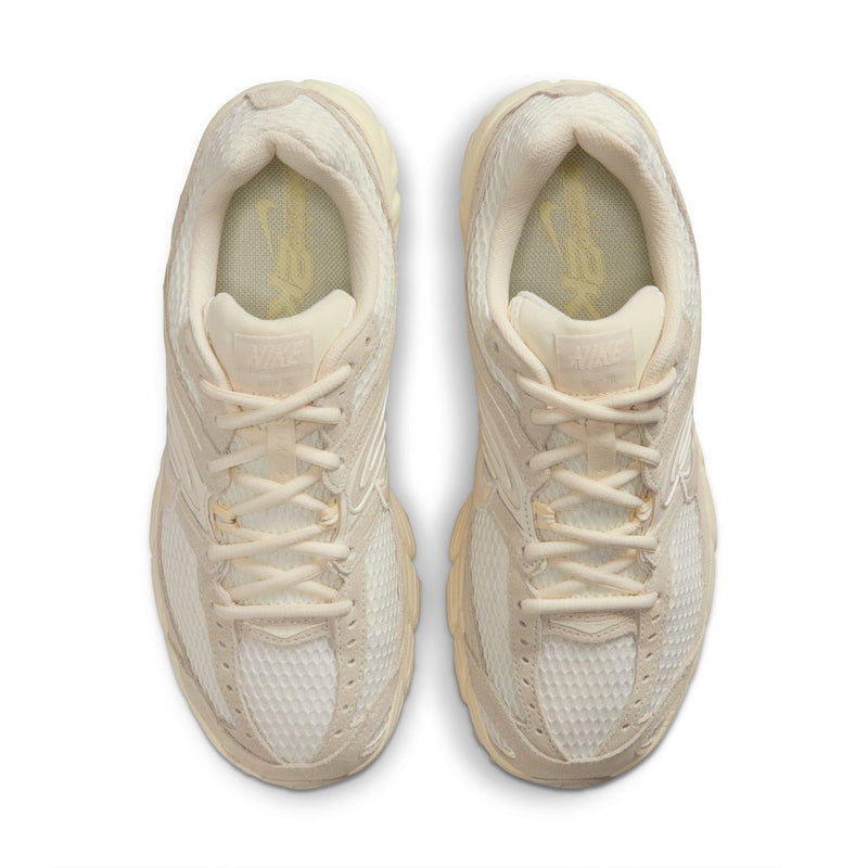Women's beige sneakers with lace-up front and padded collar, top view