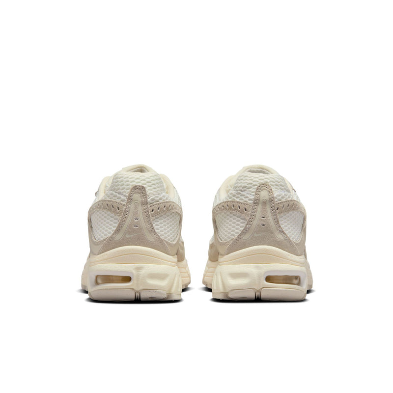 Women's beige sneakers, rear view with cushioned heel and Air Max heel window