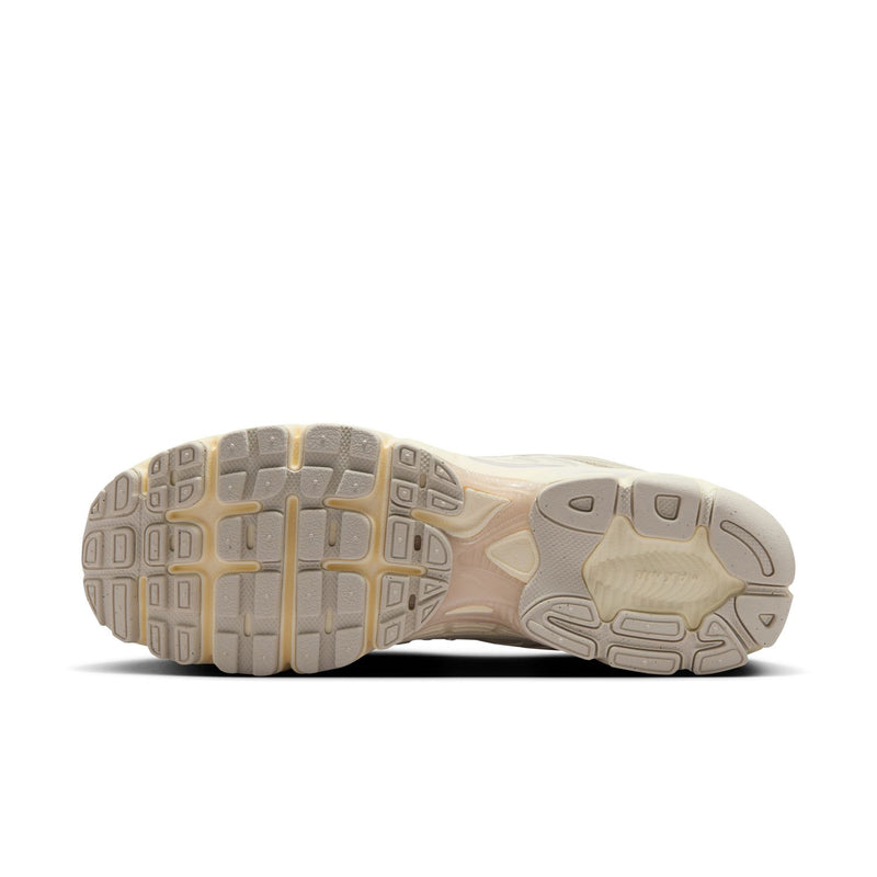 Women's beige sneaker outsoles, tread pattern with stacked midsole