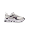 Youth running shoes with white mesh upper, purple Swoosh, and chunky Air-cushioned sole
