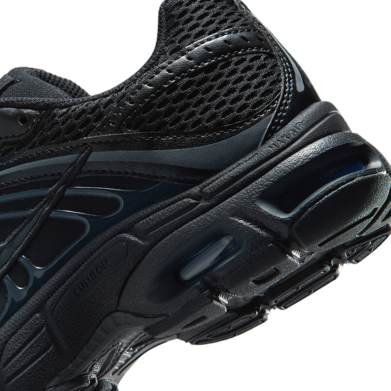 Youth black running sneaker side view with air-cushion heel detail