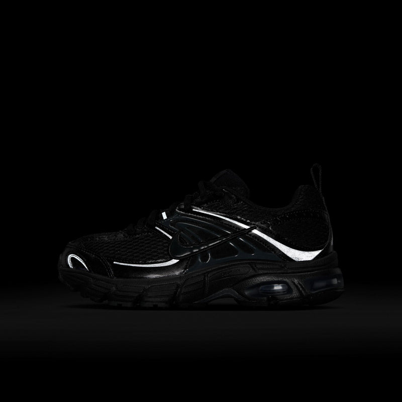Youth black sneakers with white accent stripe and visible air heel unit
