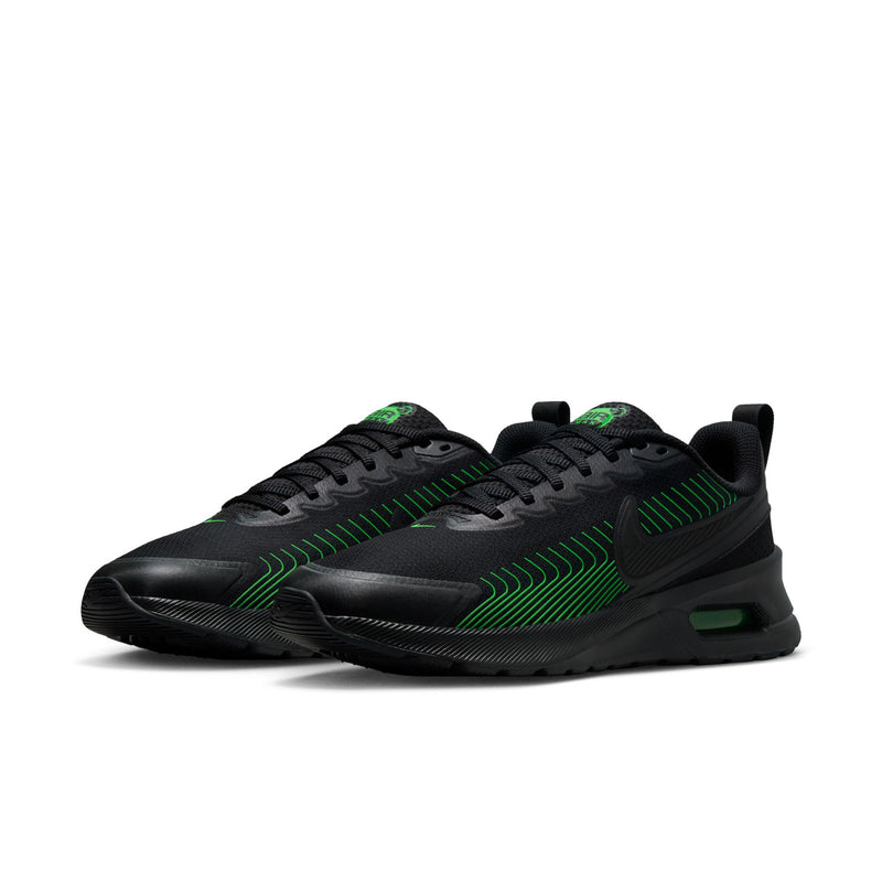 Men's black low-top sneakers with green accent stripes, lace-up, and Air unit window