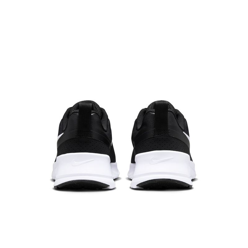 Men's Air Max NuAxis sneakers, back view with black upper and white heel midsole.