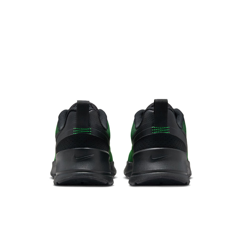 Men's black sneakers heel view with green trim and padded back collar