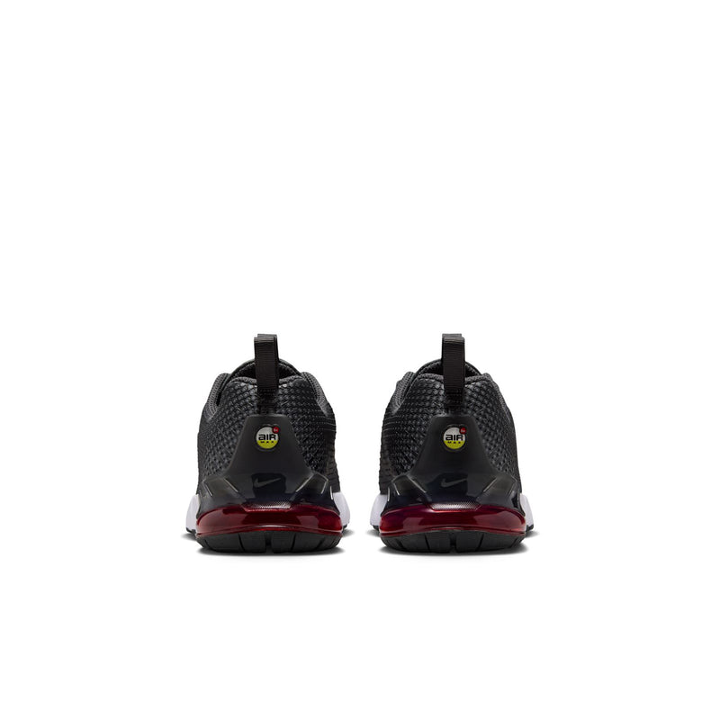 Kids' black sneakers with visible heel air unit and small back logos