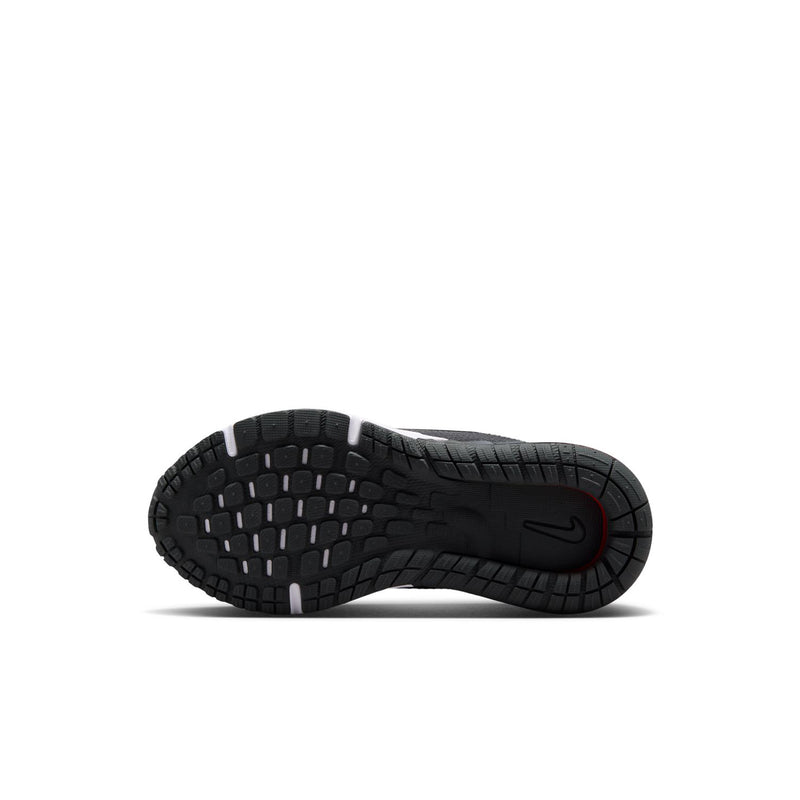 Kids' black rubber outsole with grip tread and small side logo