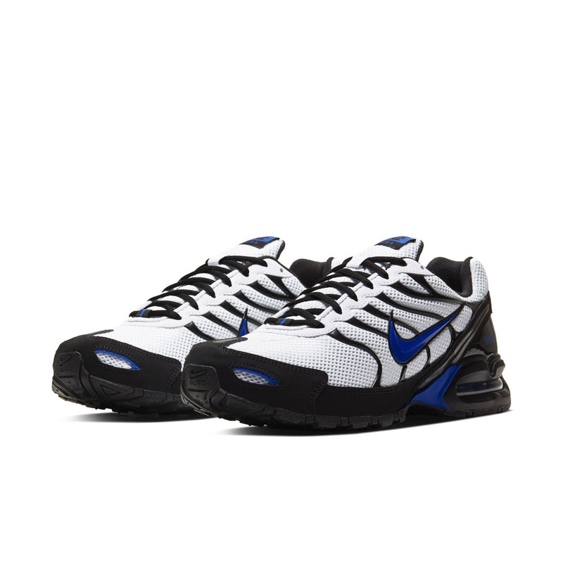 Men's running shoes, white and black with blue Swoosh and visible Air cushioning