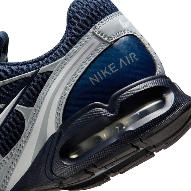 Nike Air Max Torch 4 close-up, side air unit with dark sole and navy upper