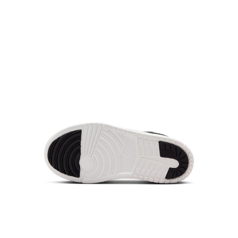 Kids low-top sneakers outsole view with white tread and dark toe bumper