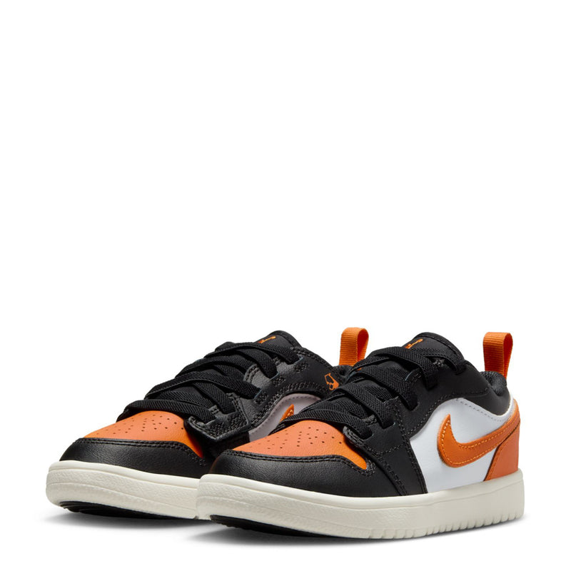 Kids low-top sneakers front angle, orange toe with black laces and white side