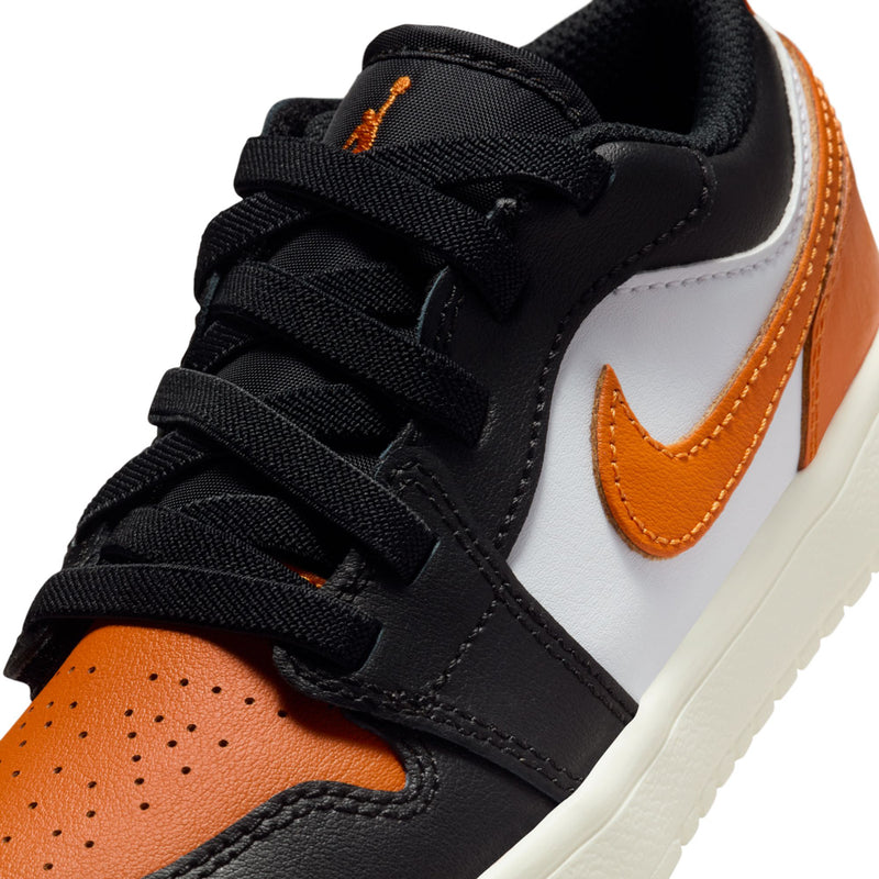 Kids low-top sneakers lace and side detail, black leather with orange Swoosh