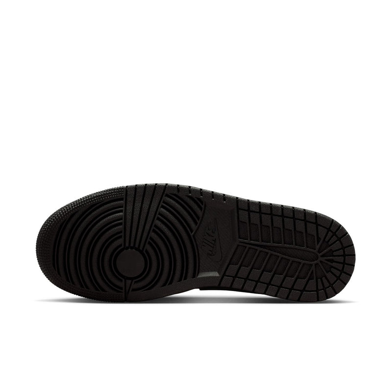 Black low-top sneaker outsole with tread and Jumpman logo details.