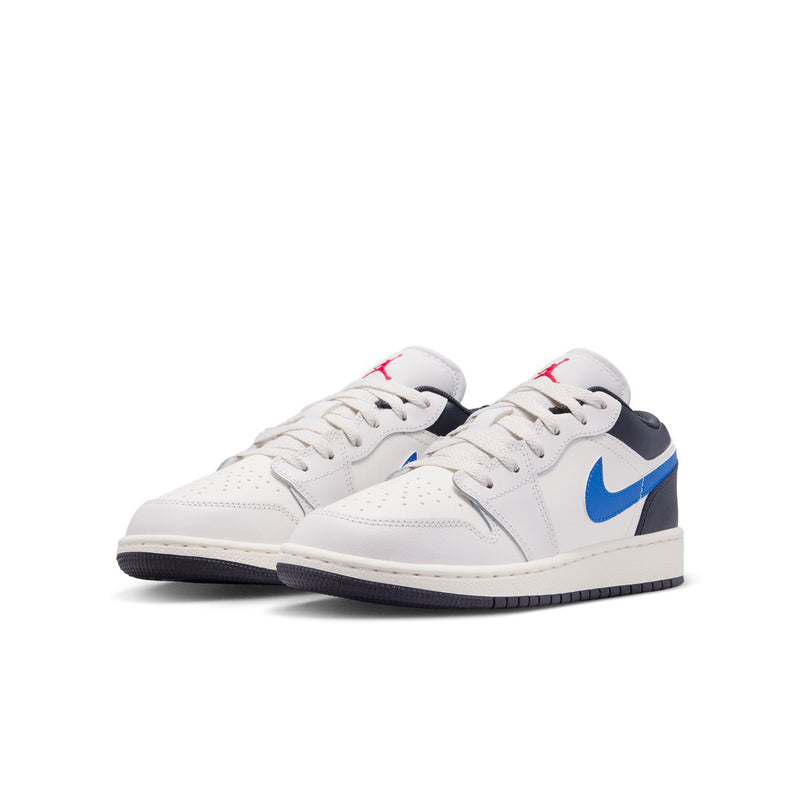 Youth low-top sneakers pair, white uppers with blue Swoosh, black heel, red details