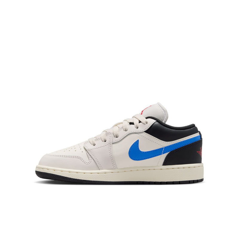 Youth low-top sneakers side view, white leather with blue Swoosh and black toe panel