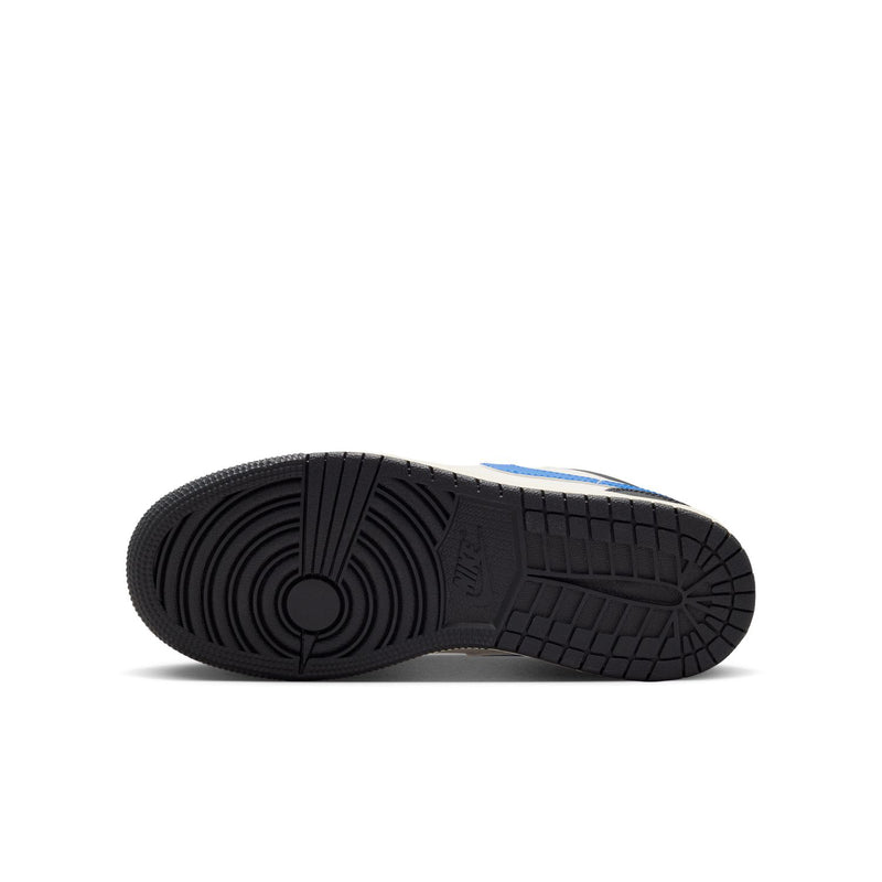 Youth low-top sneaker outsole, textured black rubber tread with blue stripe edge