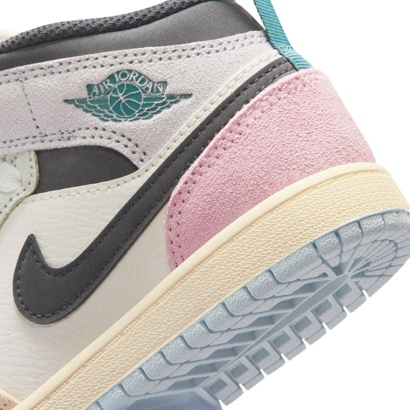 Kids AJ 1 Mid sneaker detail, AIR JORDAN wing logo, black swoosh, pink suede panel