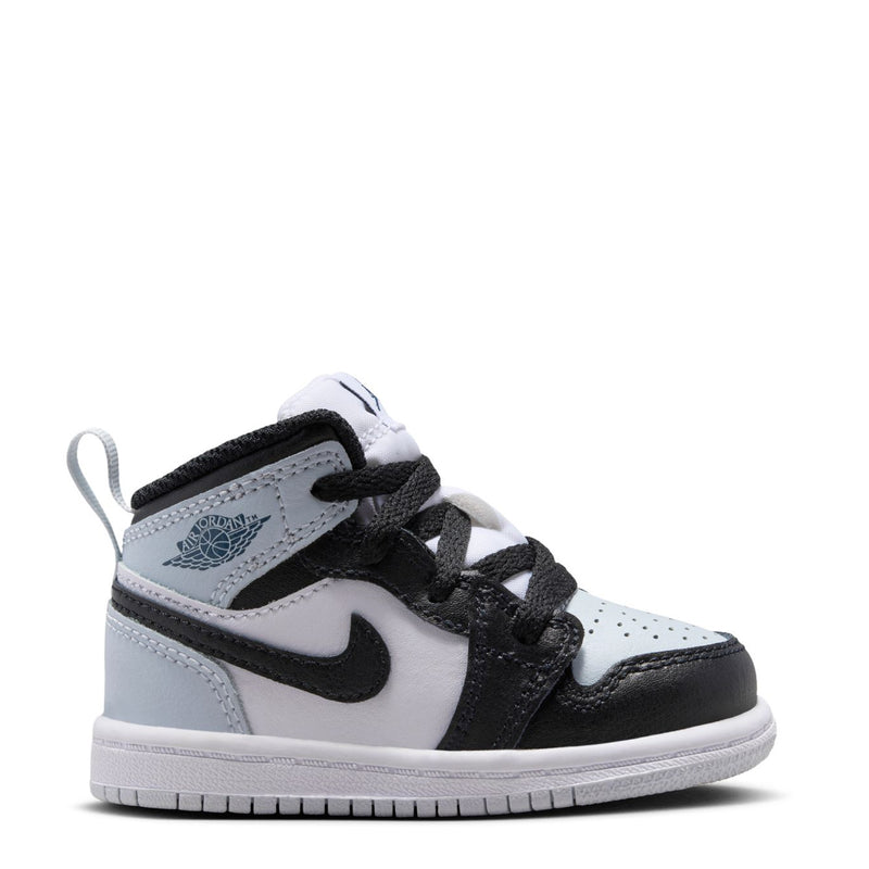 Toddler mid-top sneakers in white, black, and dark gray with black laces and swoosh