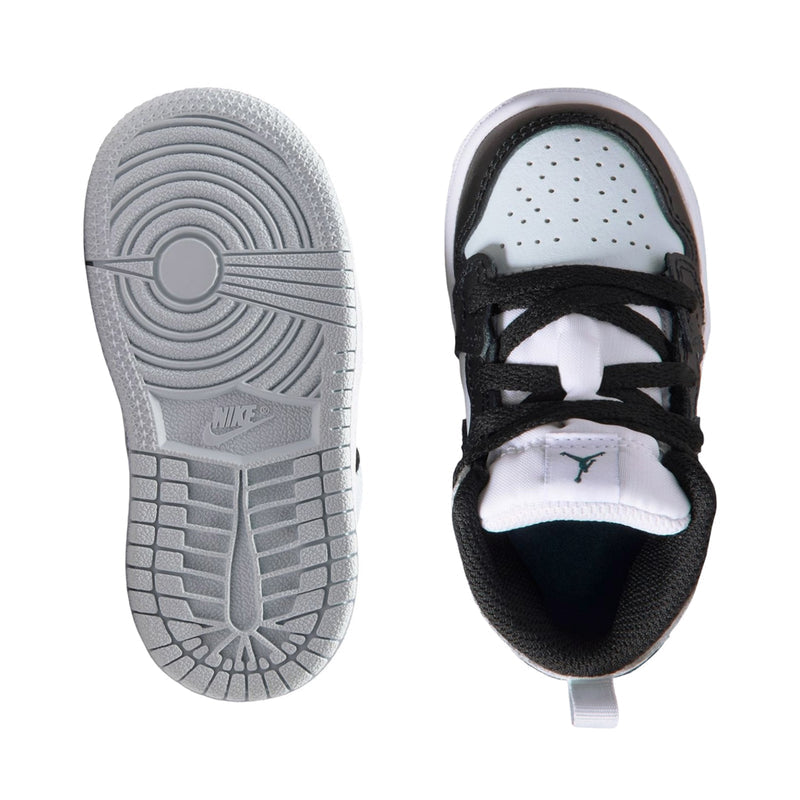 Toddler mid-top sneakers: outsole tread view and inside opening with lace-up black upper
