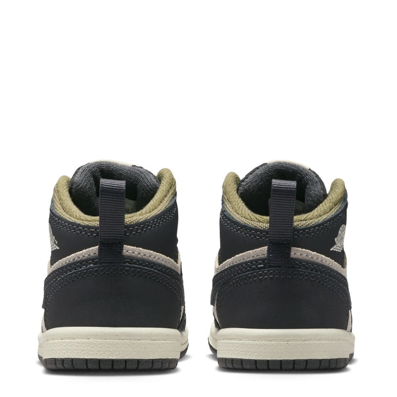 Toddler mid-top sneakers heel view, black uppers with off-white sole and olive collar