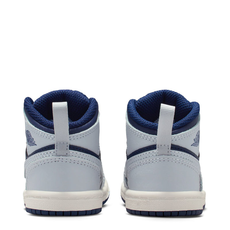 Toddler mid-top sneakers heel view in blue and white with padded collar and lace tab