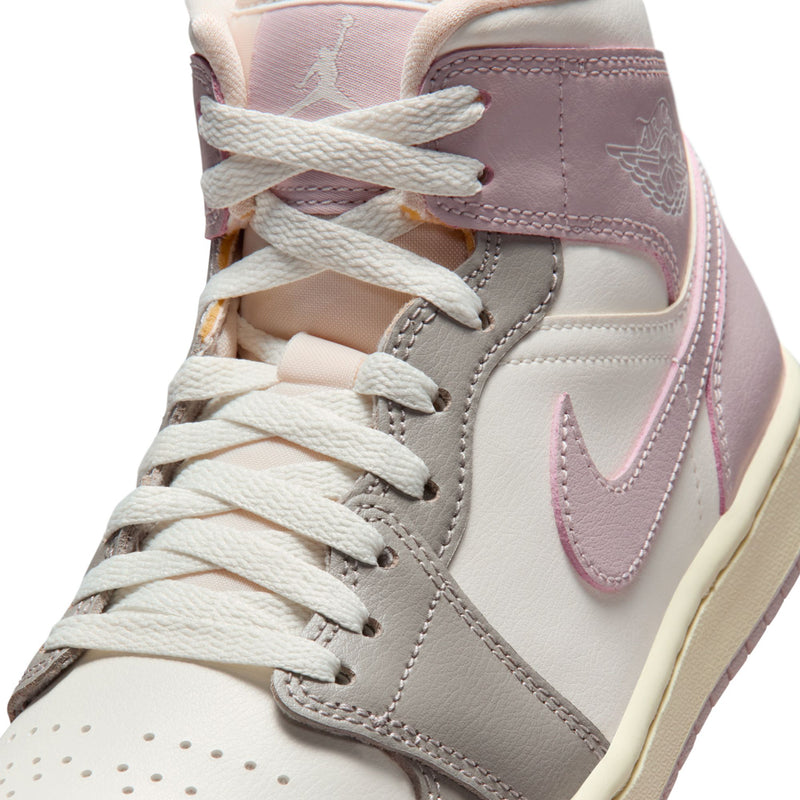 AJ 1 Mid lace-up upper close-up with sail laces and pale pink plus gray overlays