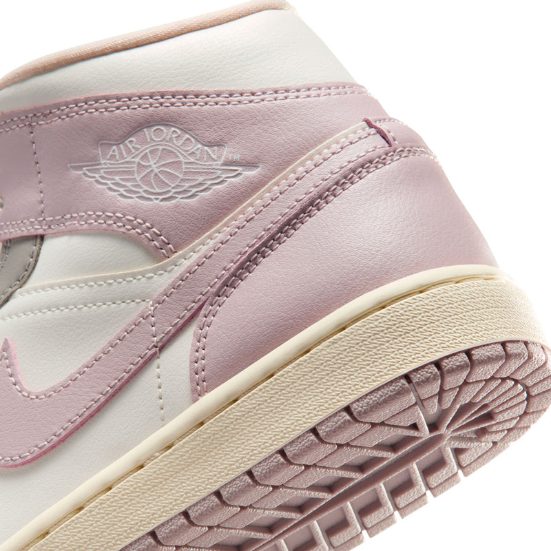 AJ 1 Mid side and outsole close-up with pale pink leather and cream midsole