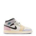 Air Jordan 1 Mid youth sneaker in white, pink, light blue, and black with teal accent