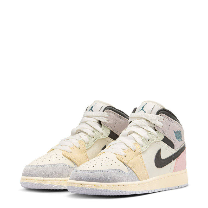 Air Jordan 1 Mid youth sneakers pair view with white uppers, teal logo, and pink trim