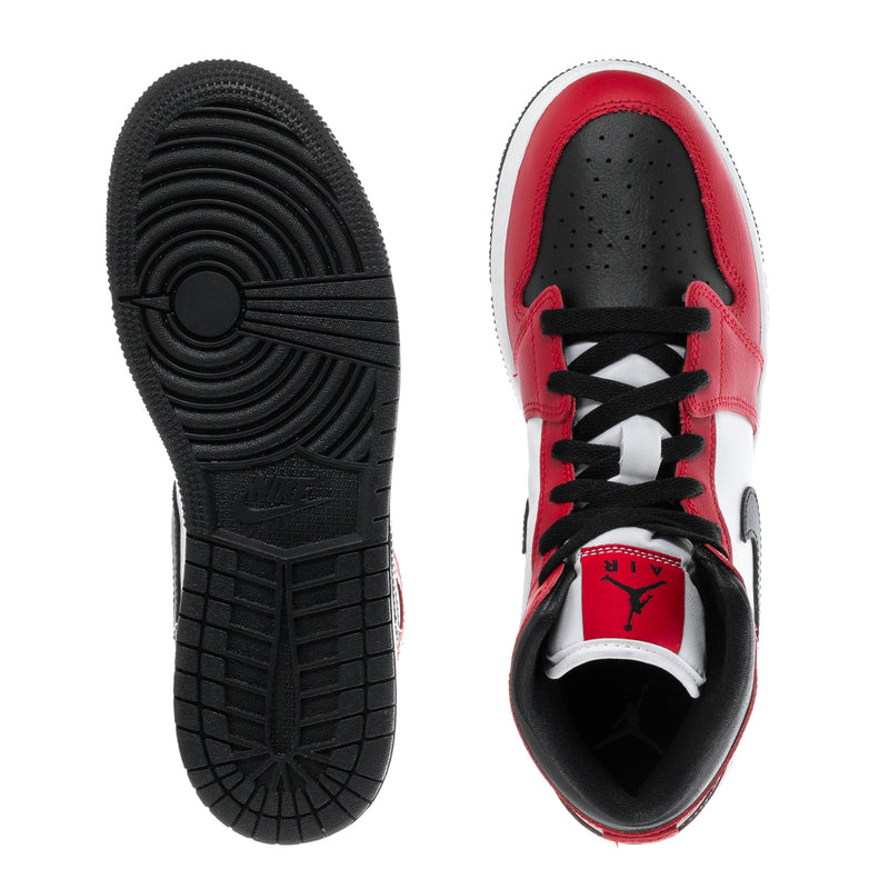 Youth sneaker outsoles and interior view; red upper with black lining and lace-up
