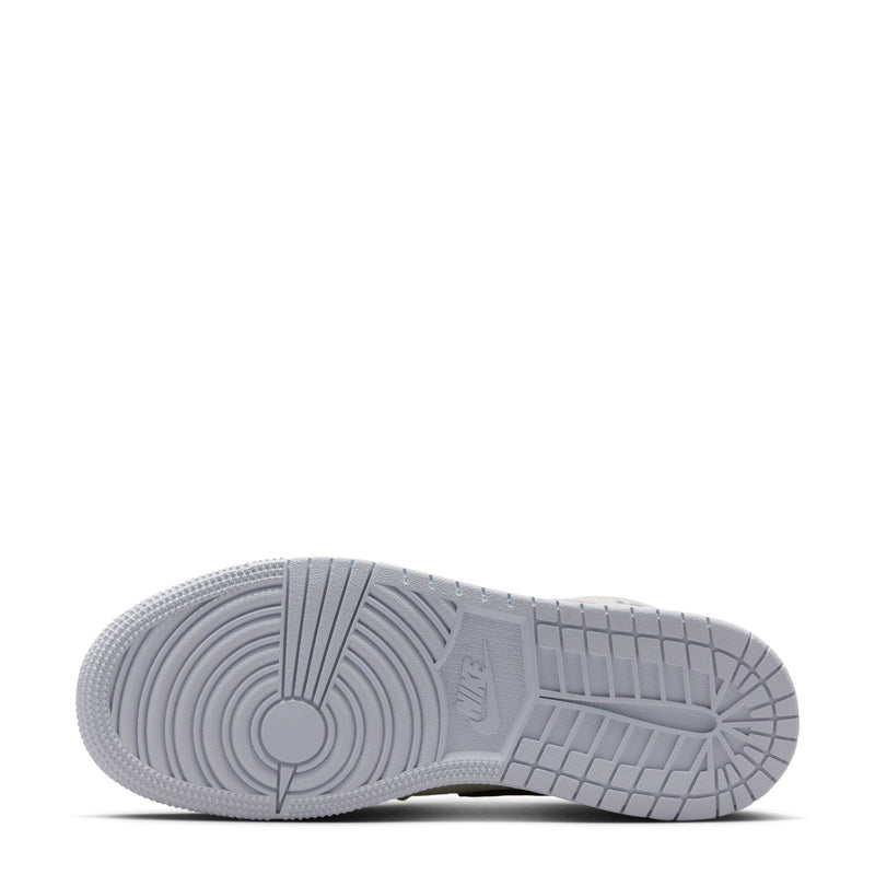 Air Jordan 1 Mid youth sneaker outsole in light gray with circular traction pattern