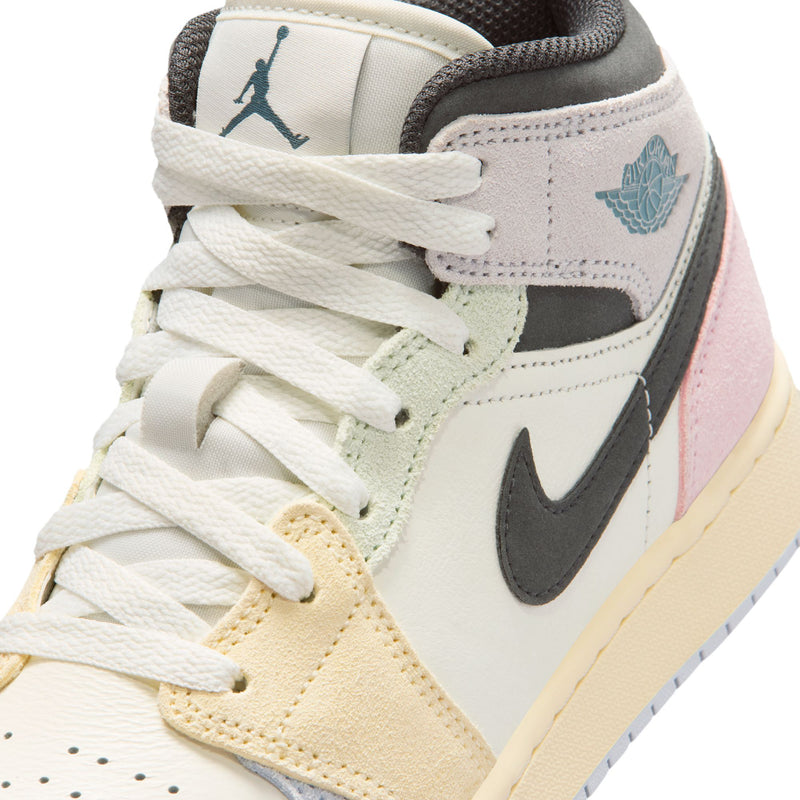Air Jordan 1 Mid youth sneaker lace and toe detail in white with teal logo and pink trim